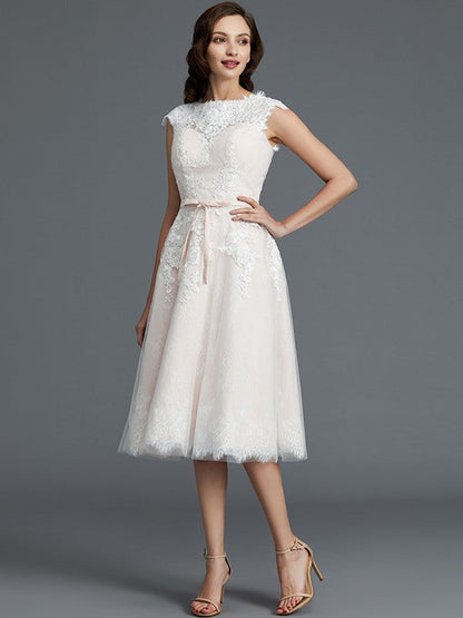 A-Line/Princess Sleeveless Bateau Knee-Length Tulle Wedding Dresses