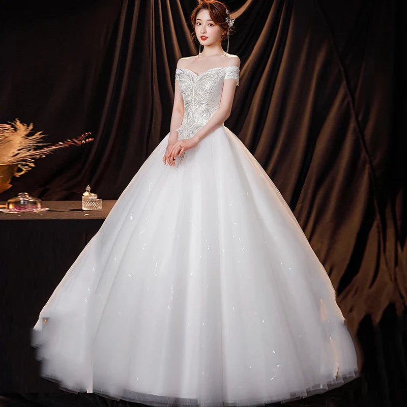 Wedding Dresses Illusion V-Neck Backless Tulle Lace Gown