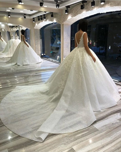 Elegant Sequined Sweetheart Wedding Dress Backless Lace Ball Gown with Appliques