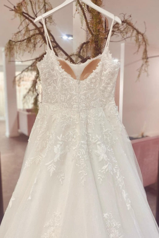 Elegant Strapless A-line Wedding Gown with Spaghetti Straps and Lace Appliques