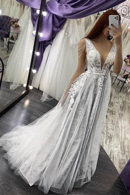 Elegant V-neck Backless A-line Bridal Gown Featuring Pearl Appliques