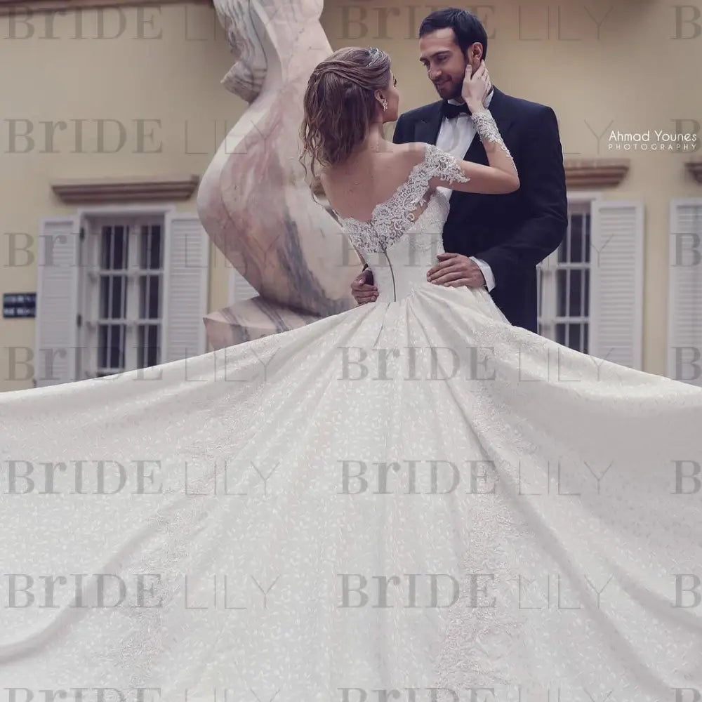 Gorgeous Off-the-Shoulder Lace A-Line Wedding Dress with Long Sleeves