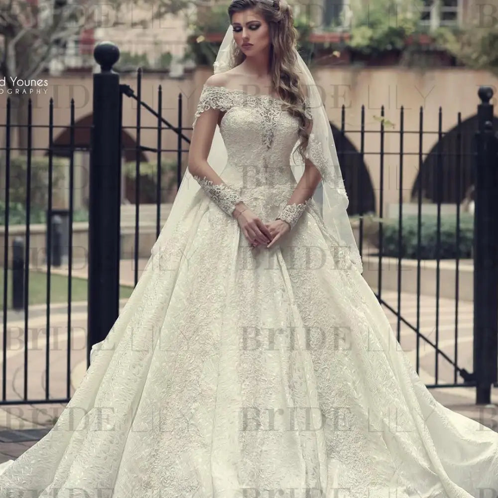 Gorgeous Off-the-Shoulder Lace A-Line Wedding Dress with Long Sleeves