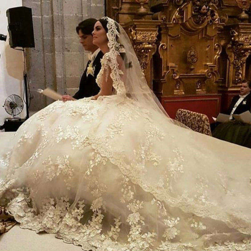 Princess Bateau Wedding Dress with Modest Backless Design and Floor-length Lace Ruffles